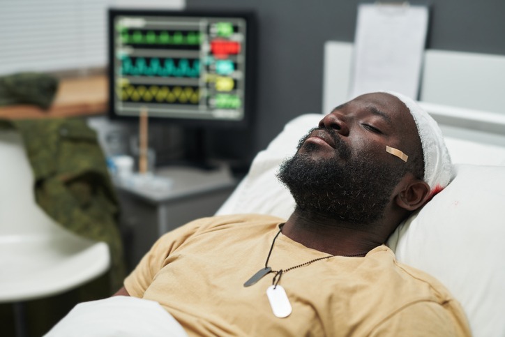 close-up-of-young-injured-soldier-with-id-tag-on-neck