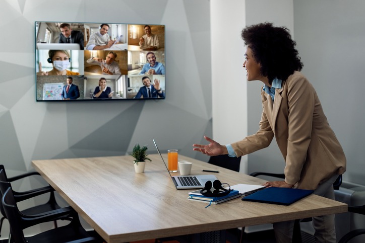 happy-black-entrepreneur-having-online-business-meeting-with-colleagues-from-her