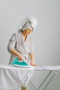 Woman ironing clothes