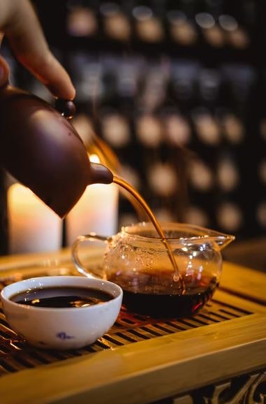 How is caffeine in tea different from the caffeine in coffee