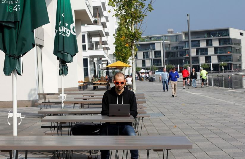 A man working alone outside