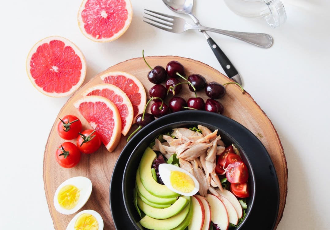 bowl of salads and fruits