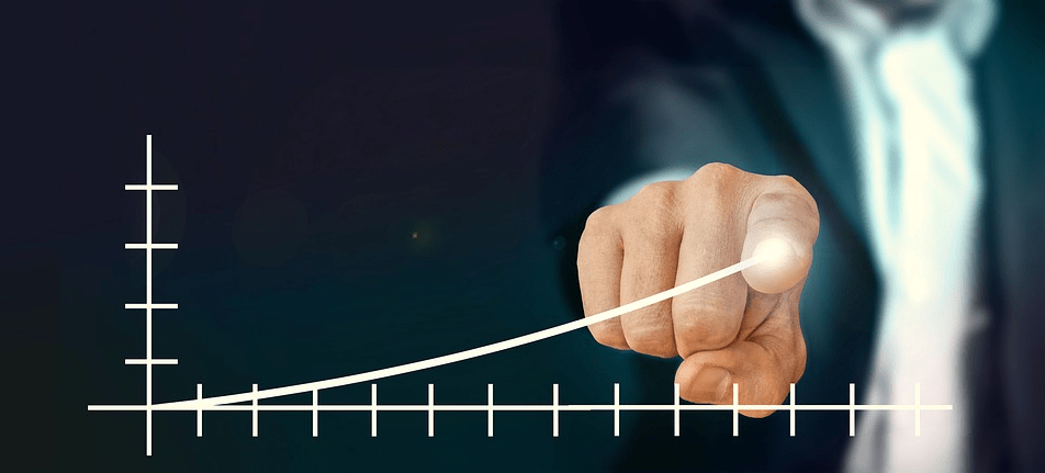a person tracing a curve line on a graph