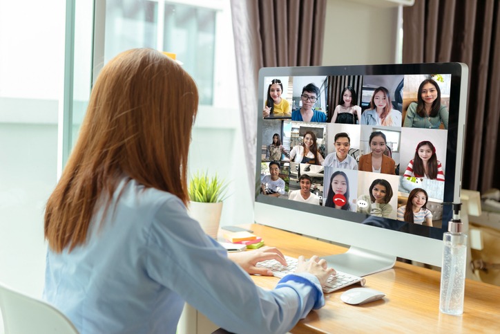 rear-view-asian-group-business-people-working-remotely-video-conference-calling